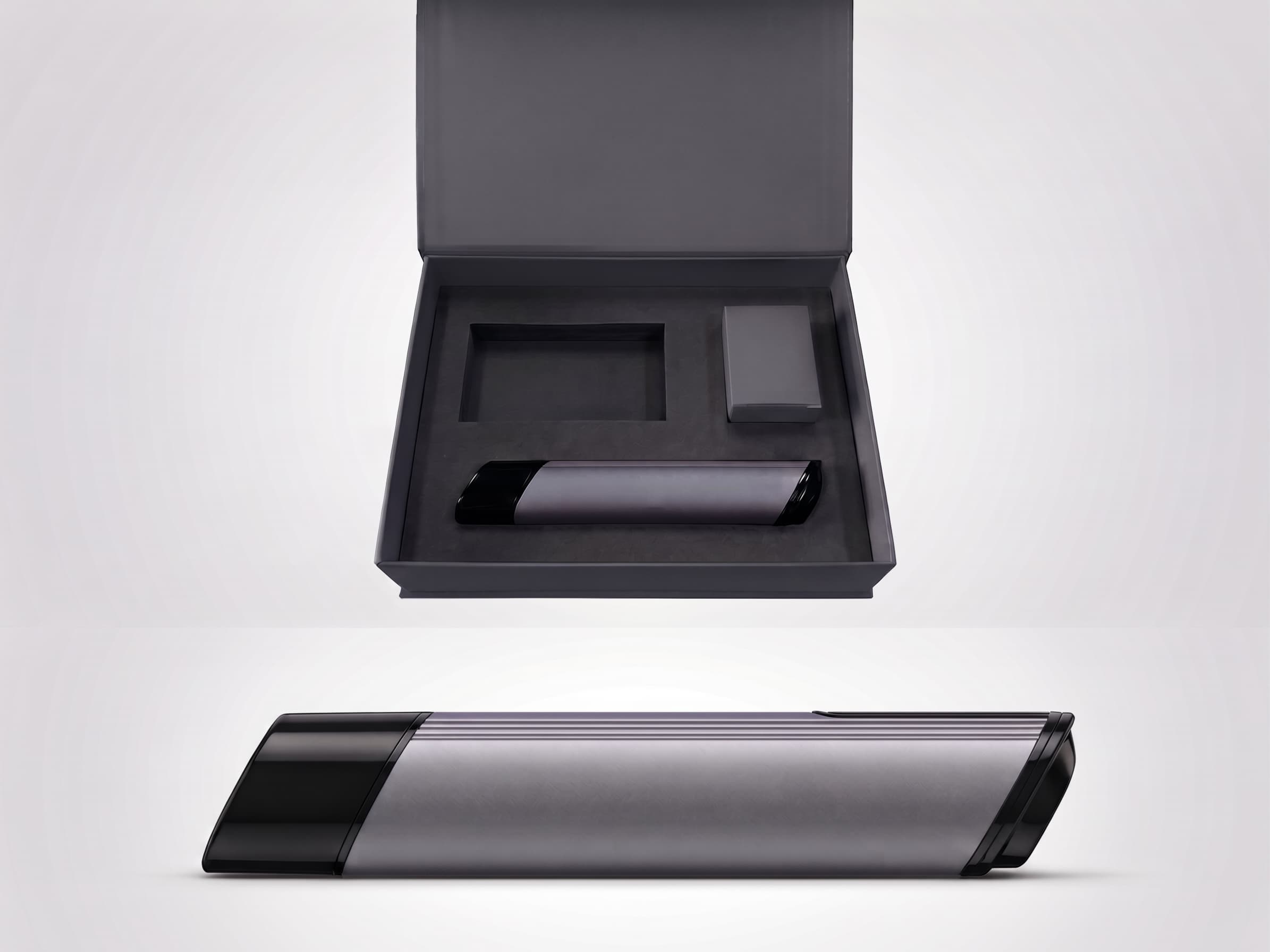SC4P Infusion Device in the OEM presentation kit: silver body, gloss-black tip, charcoal foam tray